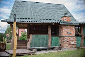 Фото номера Семейный номер с видом на озеро Загородные дома Miego klinika 2 -POILSIUI г. Kelmė 8