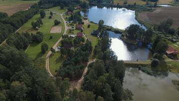 Фото номера Семейный номер с видом на озеро Загородные дома Miego klinika 2 -POILSIUI г. Kelmė 14